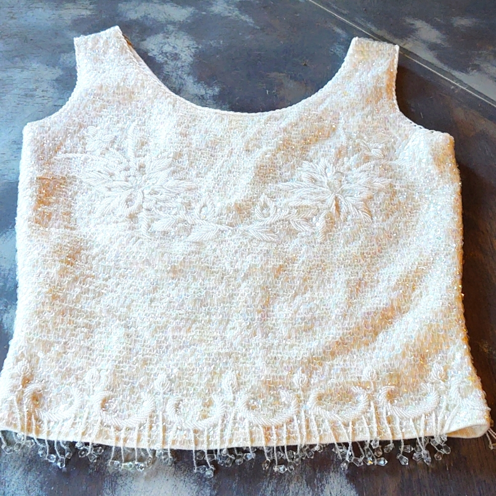 White Front fully beaded and sequined evening top.  Satin lined size small